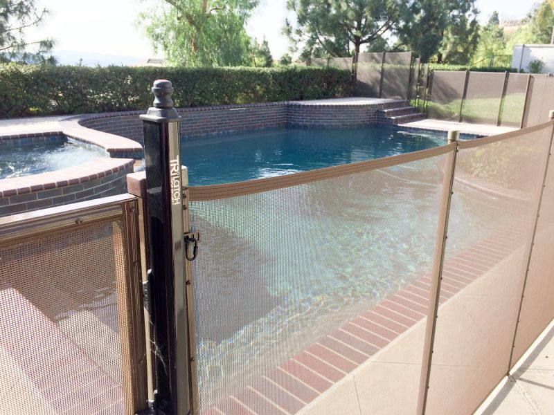 Mesh Pool Safety Fence in Place